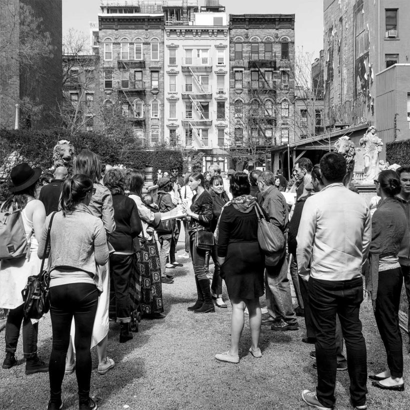 Jane's Walk participants in a garden