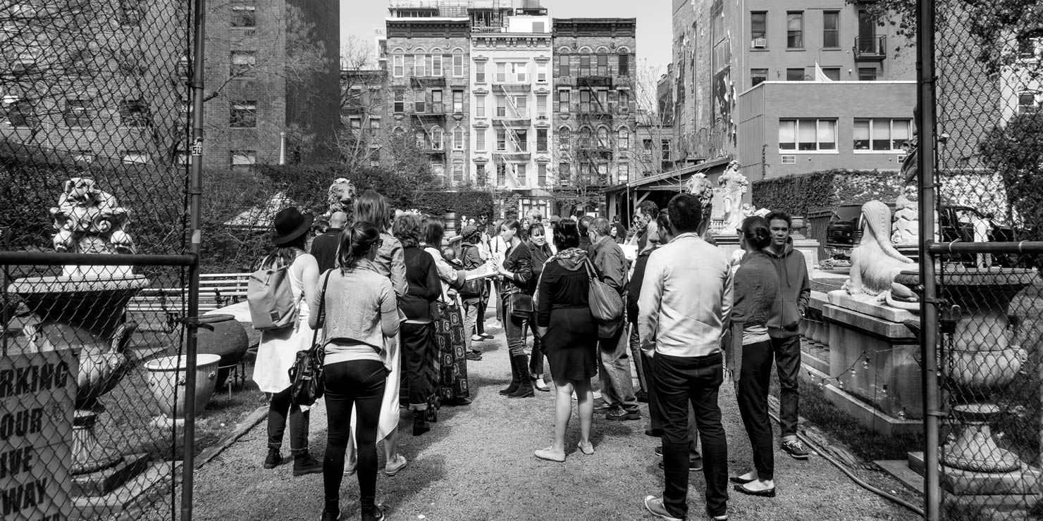 Jane's Walk participants in a garden