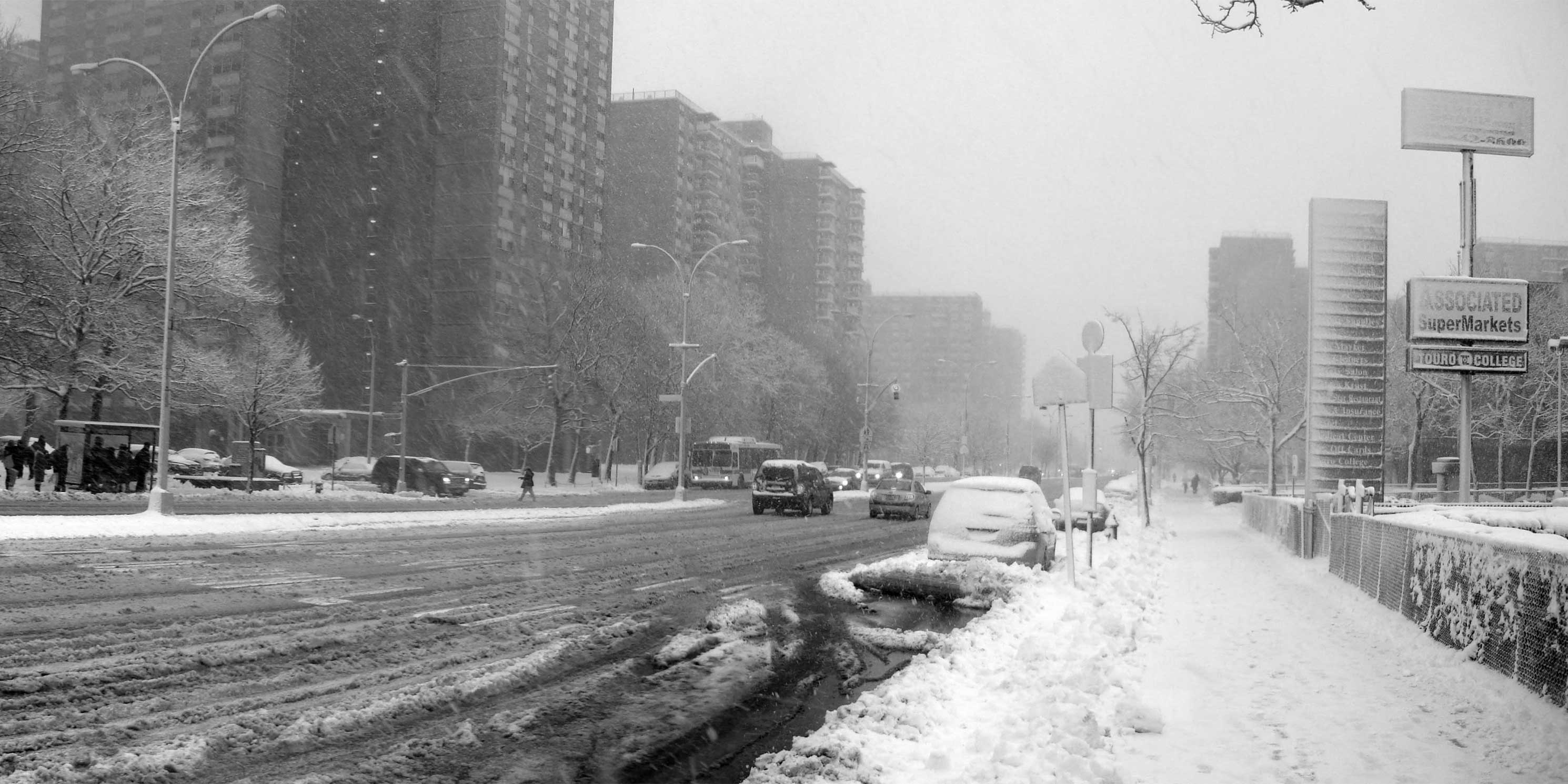 Road and sidewalk in East New York, Brooklyn, covered in snow. Photo: Wikimedia Commons, CCNY Geeks.