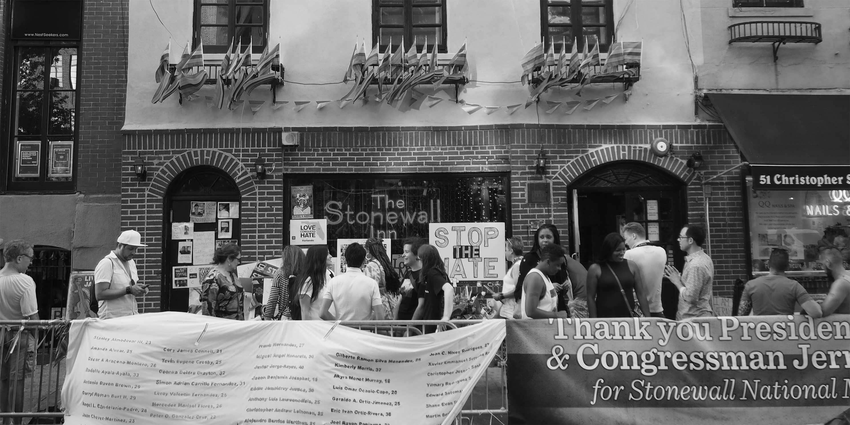 A celebration at the Stonewall Inn on Pride Weekend in 2016, the day after President Obama announced the Stonewall National Monument. Photo: Wikimedia Commons, Rhododendrites.