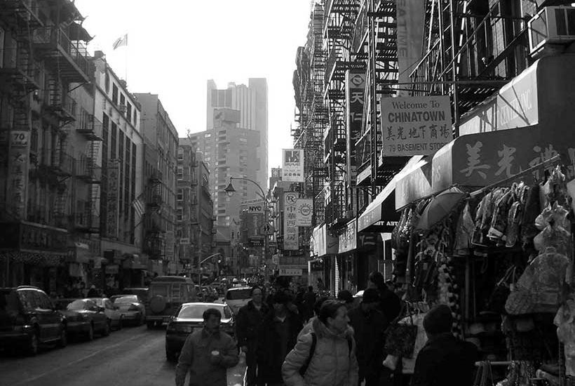 Busy shopping street in Manhattan's Chinatown. Photo: Wikimedia Commons, Philipp Schäufele.