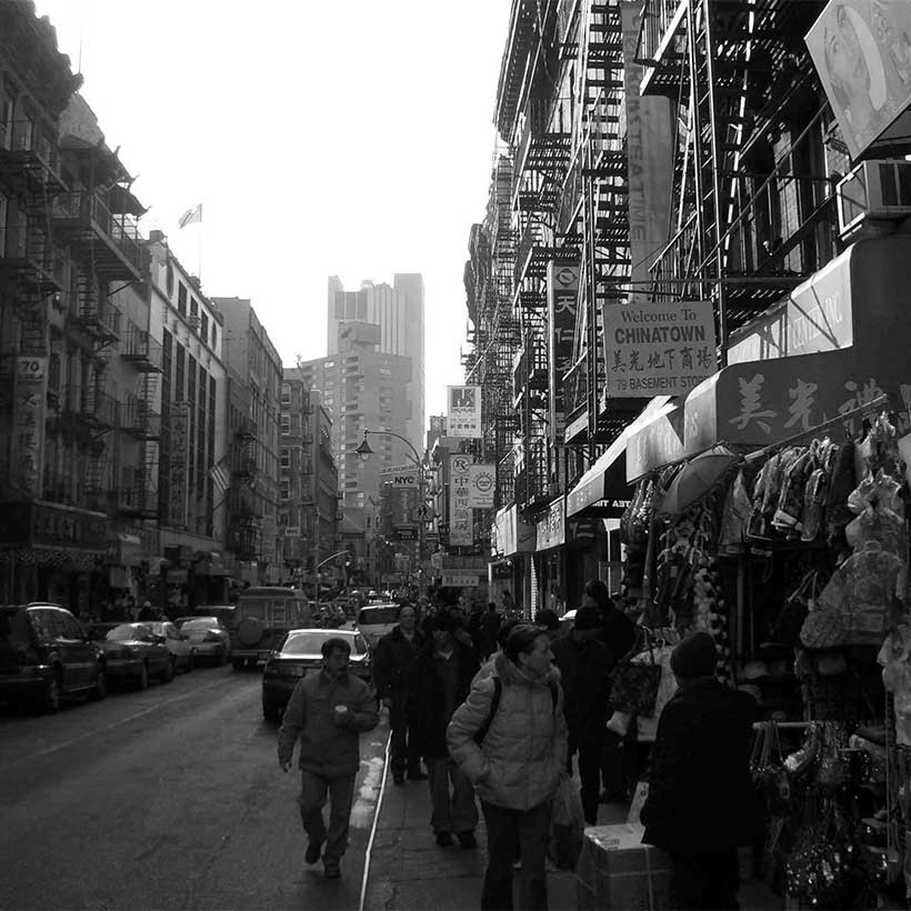 Busy shopping street in Manhattan's Chinatown. Photo: Wikimedia Commons, Philipp Schäufele.