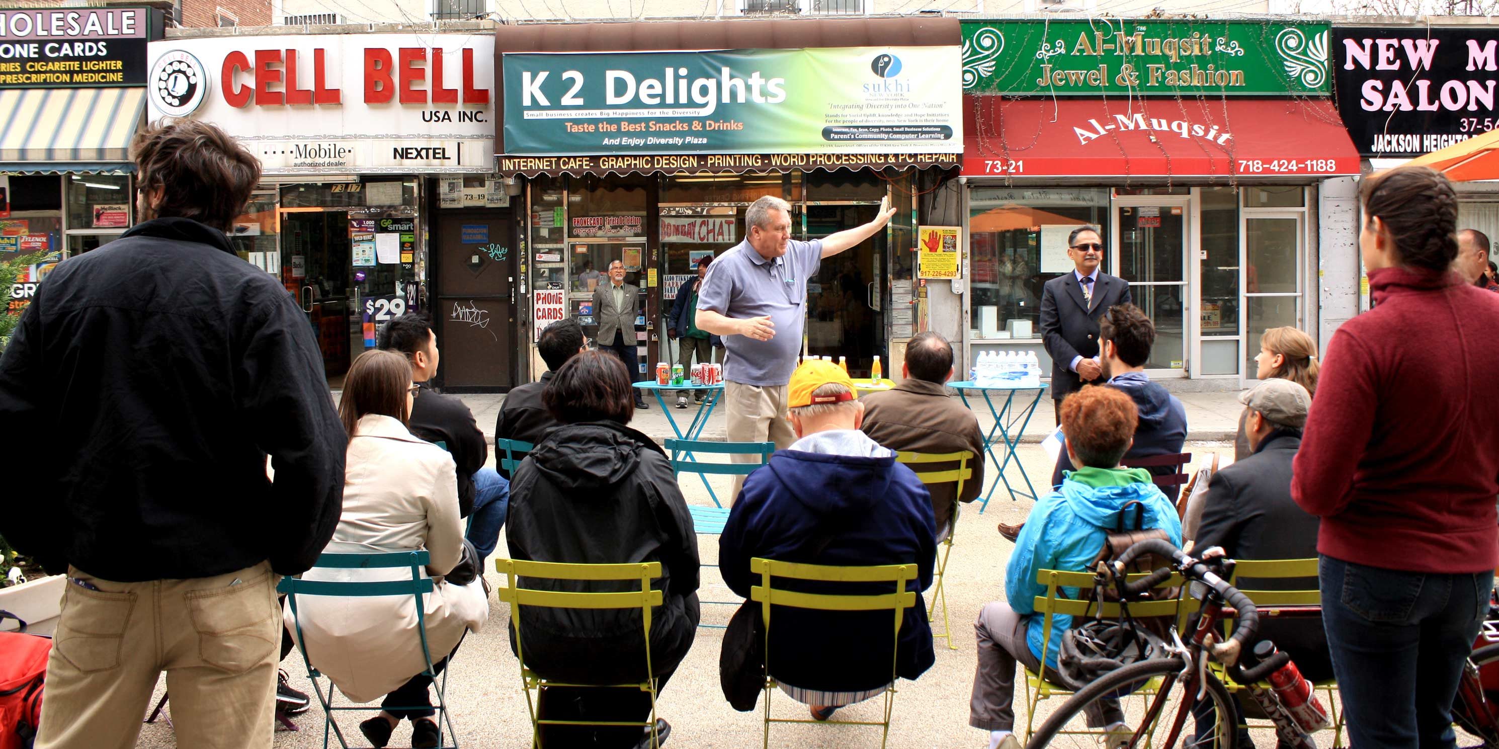 Danny Dromm speaks during a Jane's Walk in Queens