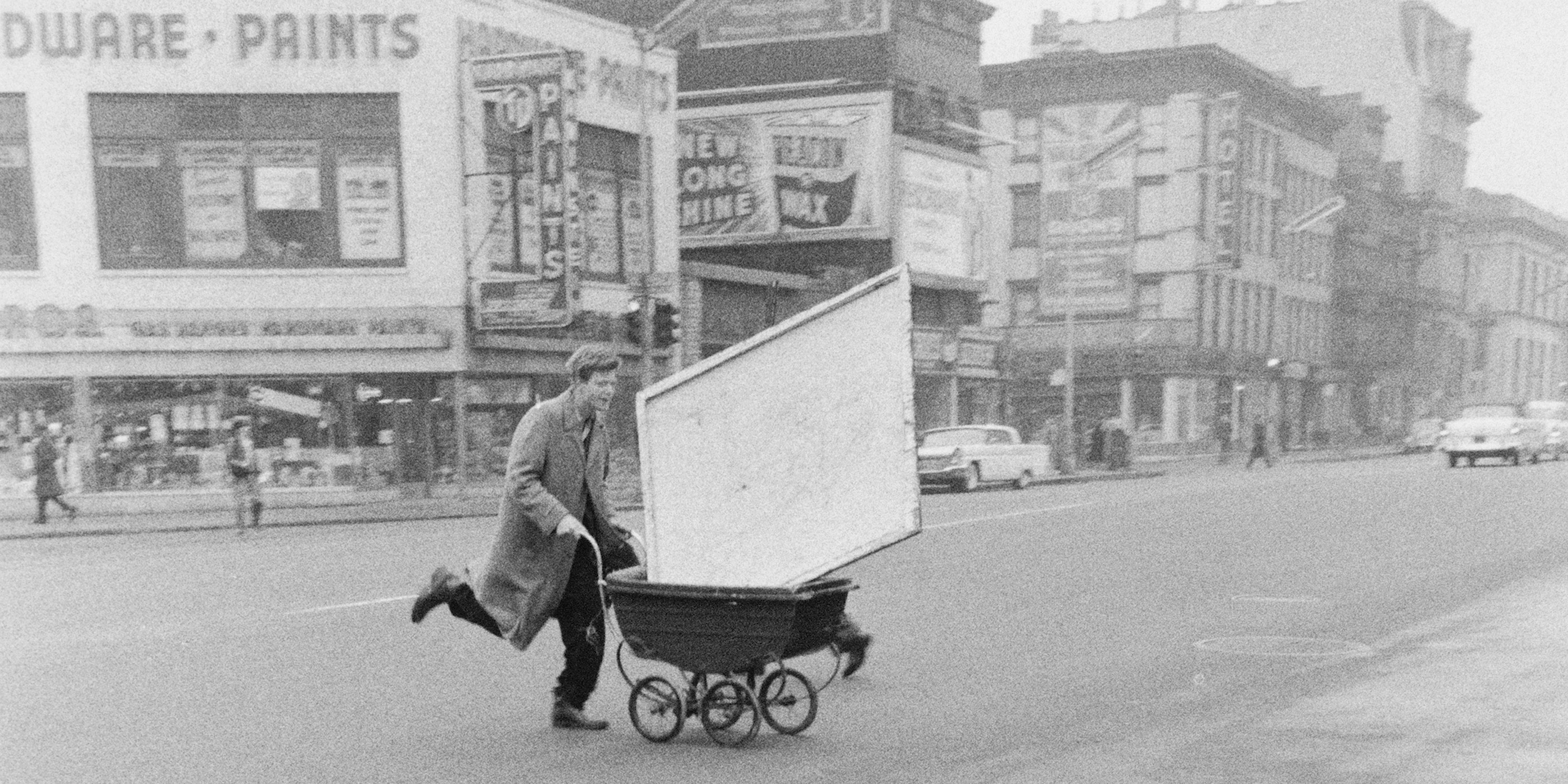 Red Grooms transporting artwork to Reuben Gallery, New York, 1960.