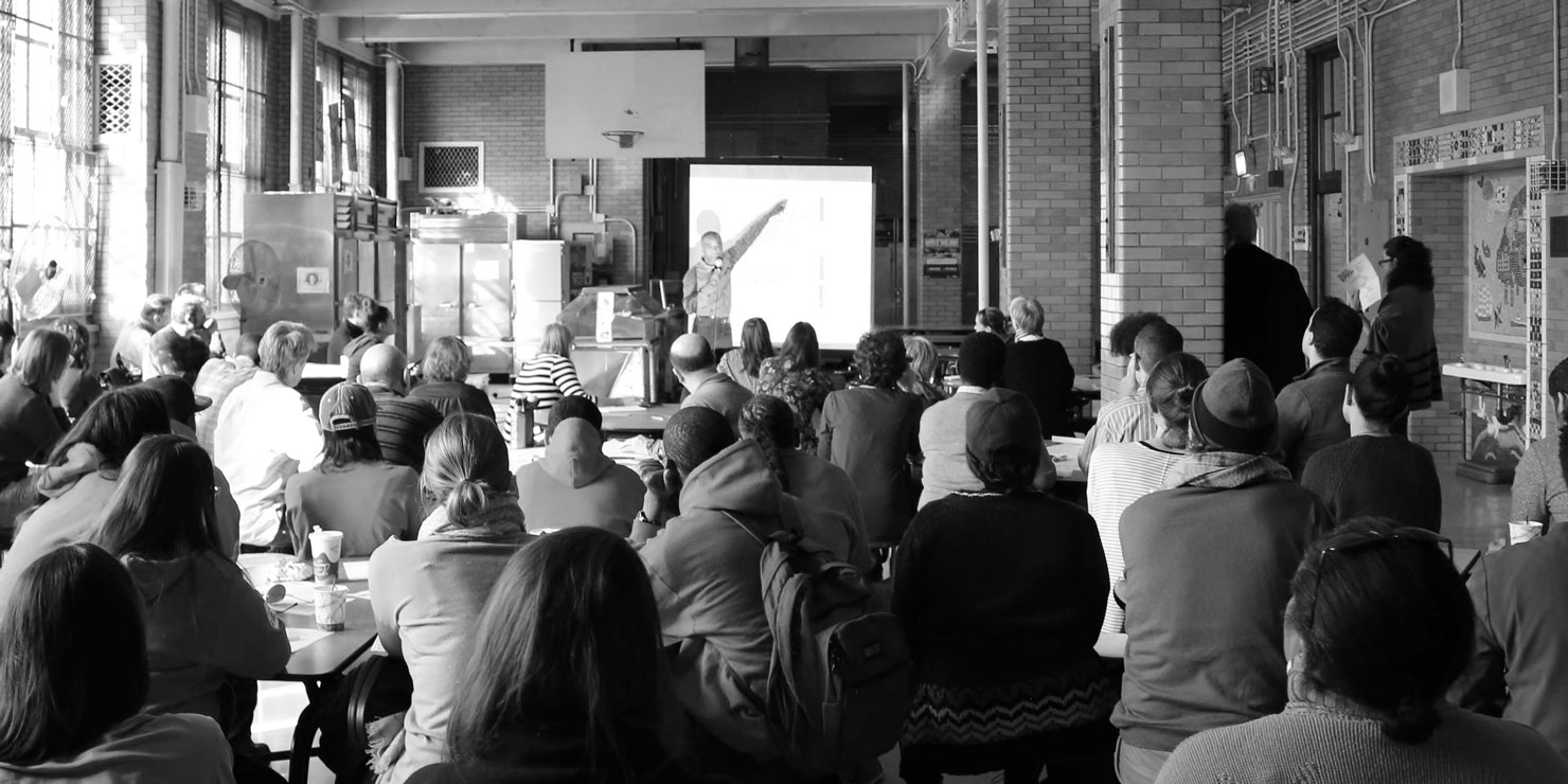 speaker and audience at workshop