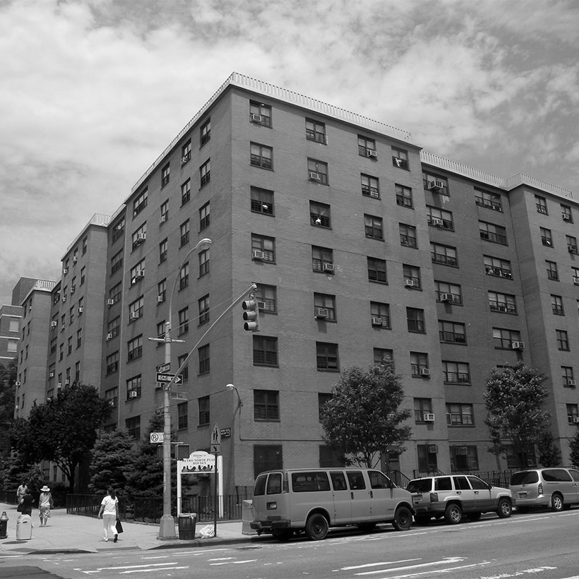Exterior of the Plaza Houses in the East Harlem neighborhood of Manhattan. Photo: Wikimedia Commons, Jim Henderson.