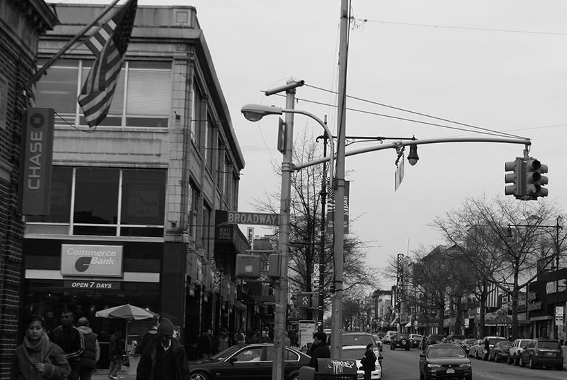 Corner of Broadway and Steinway Street in Astoria, Queens, New York City. Photo: Wikimedia Commons, Aude.