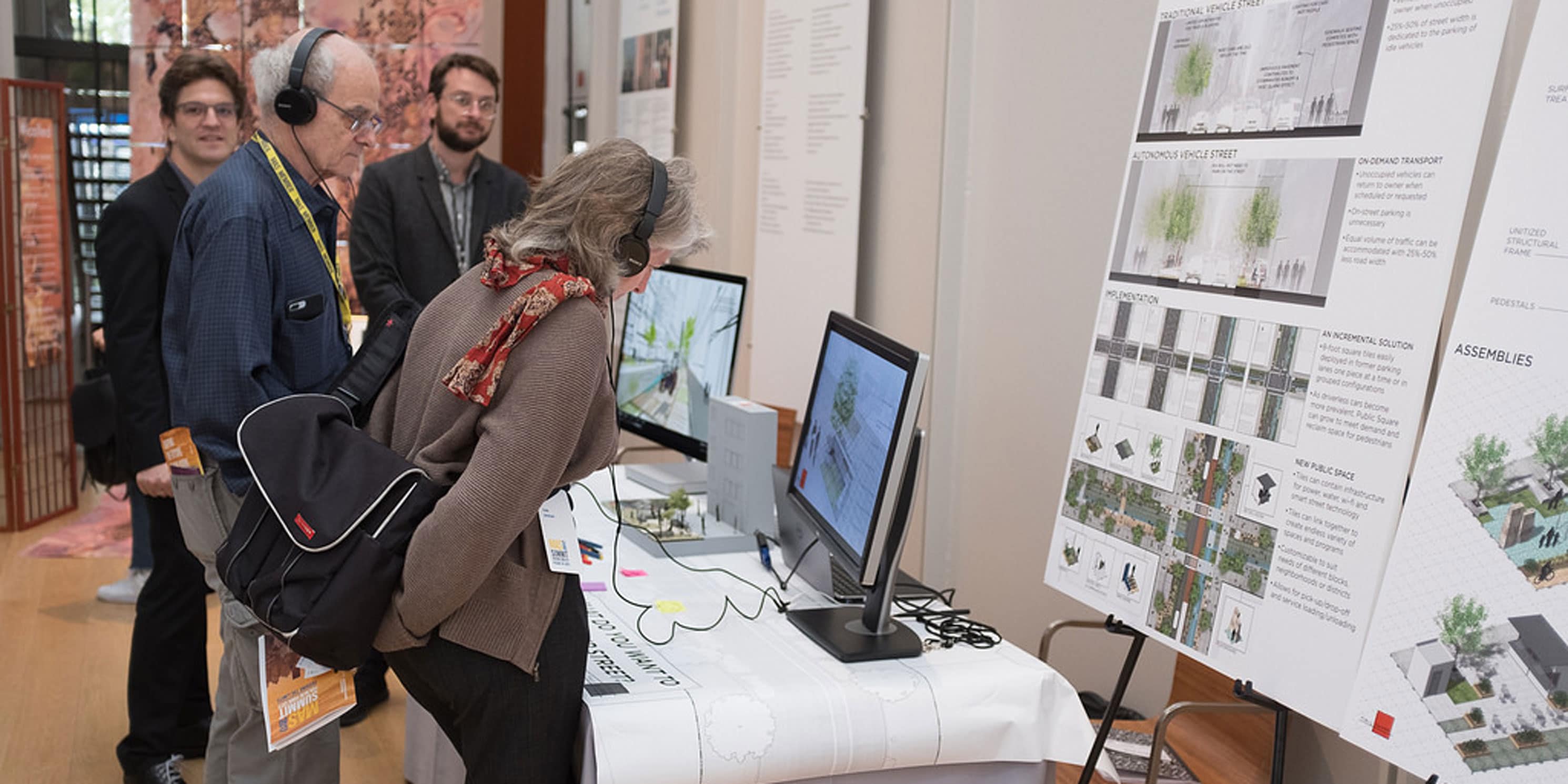 Attendees views exhibits at the Summit