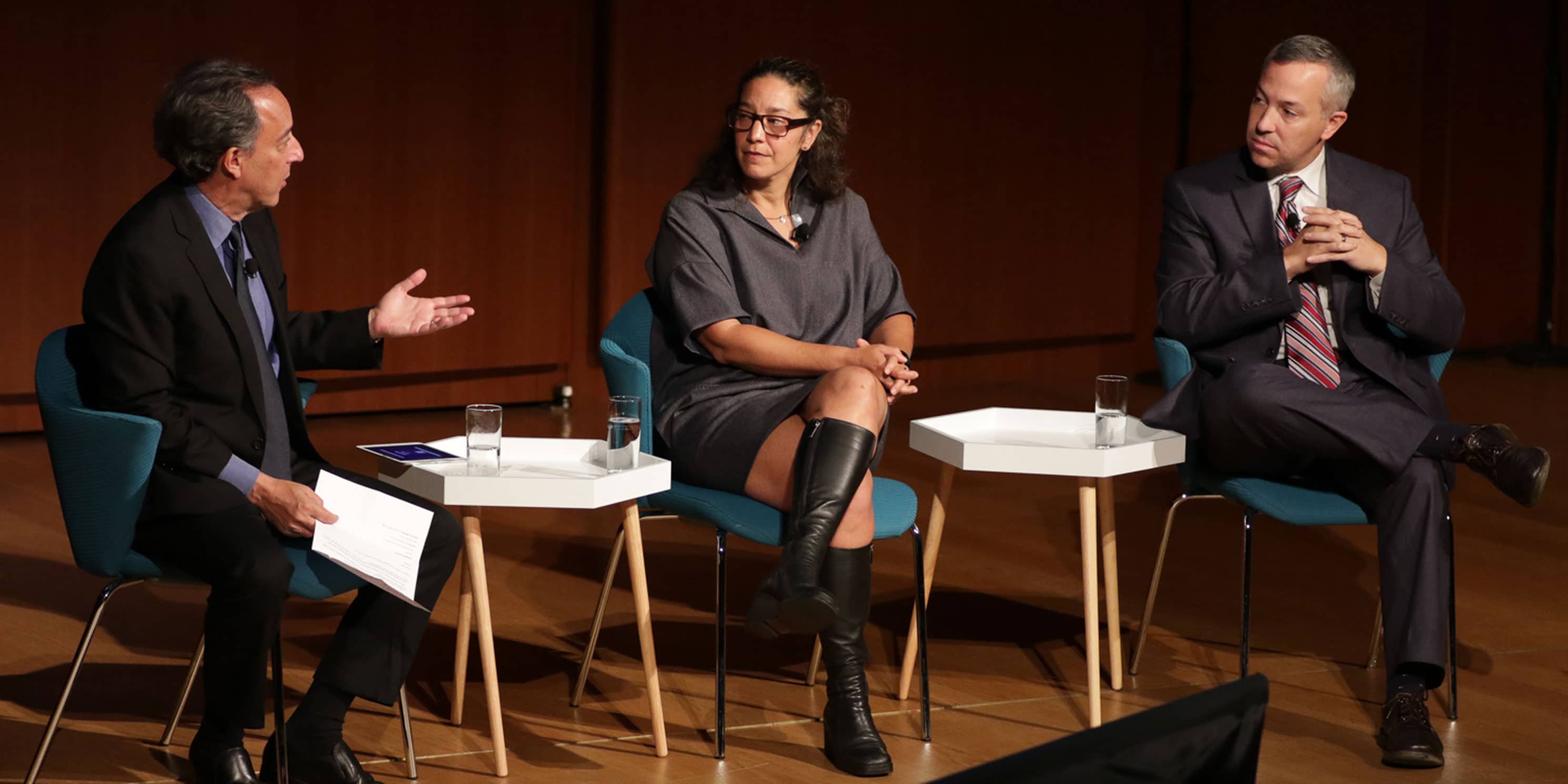 Michael Kimmelman, Daniel A. Zarrilli, and Gita Nandan on stage at Summit