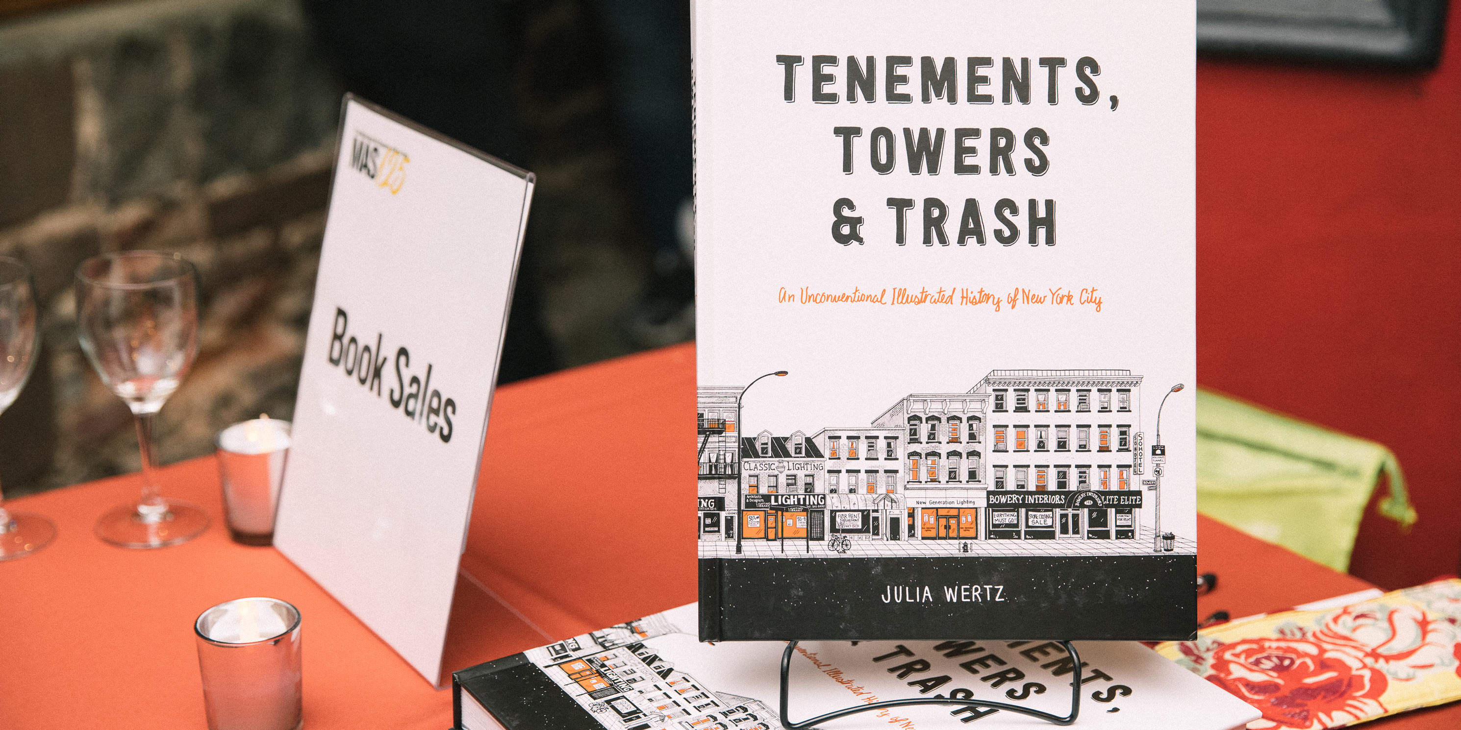 Tenements, Towers & Trash: An Unconventional Illustrated History of New York, by Julia Wertz displayed on table