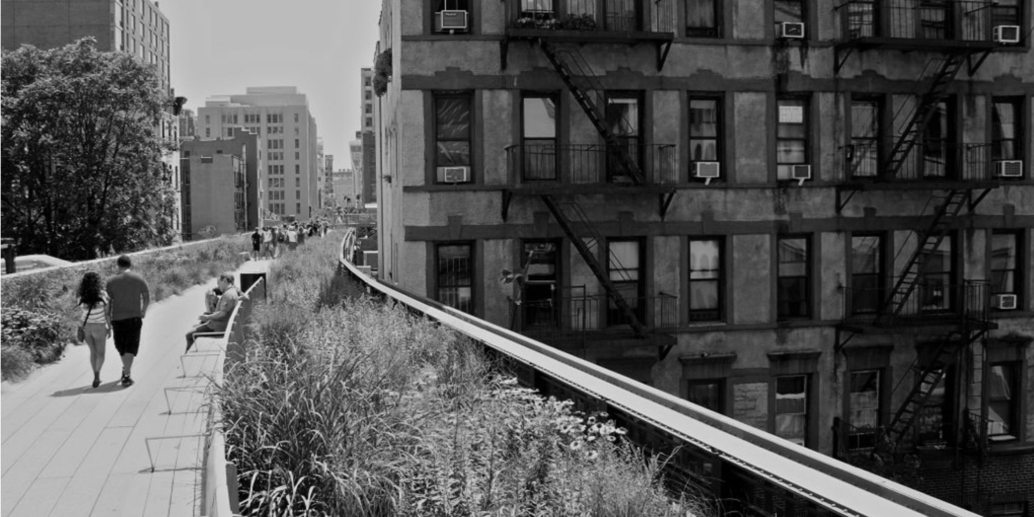 People stroll on The High Line in Manhattan