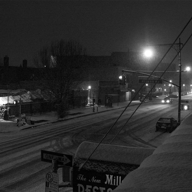 Fulton Street in Brooklyn on a snowy evening