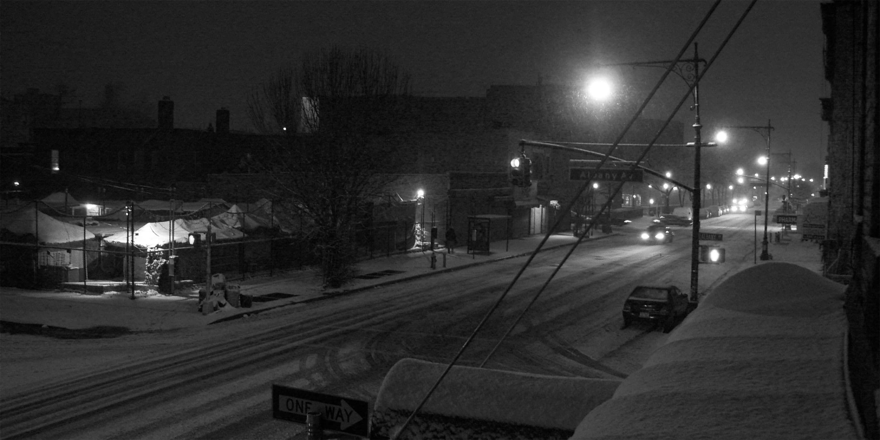 Fulton Street in Brooklyn on a snowy evening