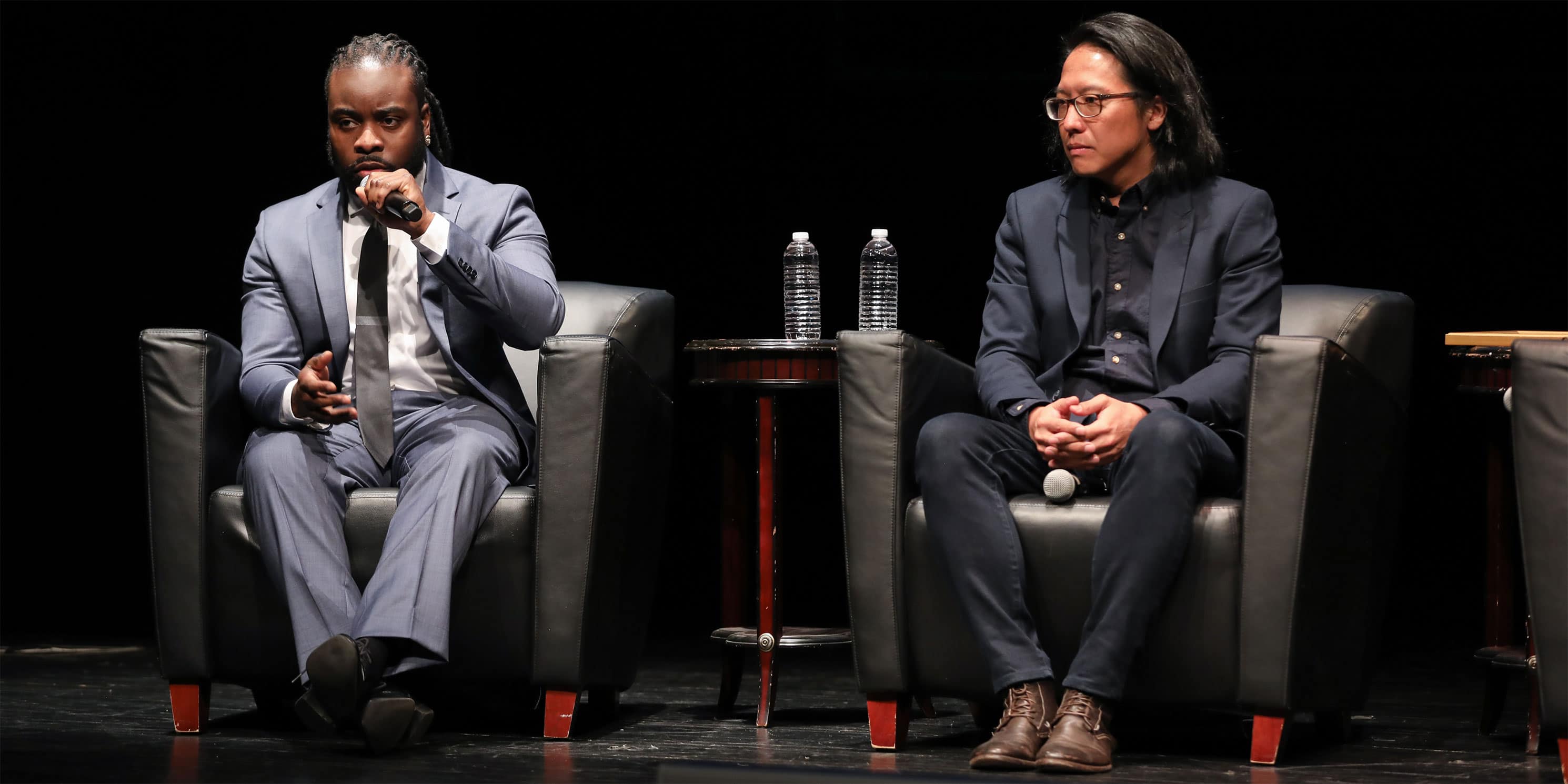 Stephen Maing and Lieutenant Edwin Raymond on stage