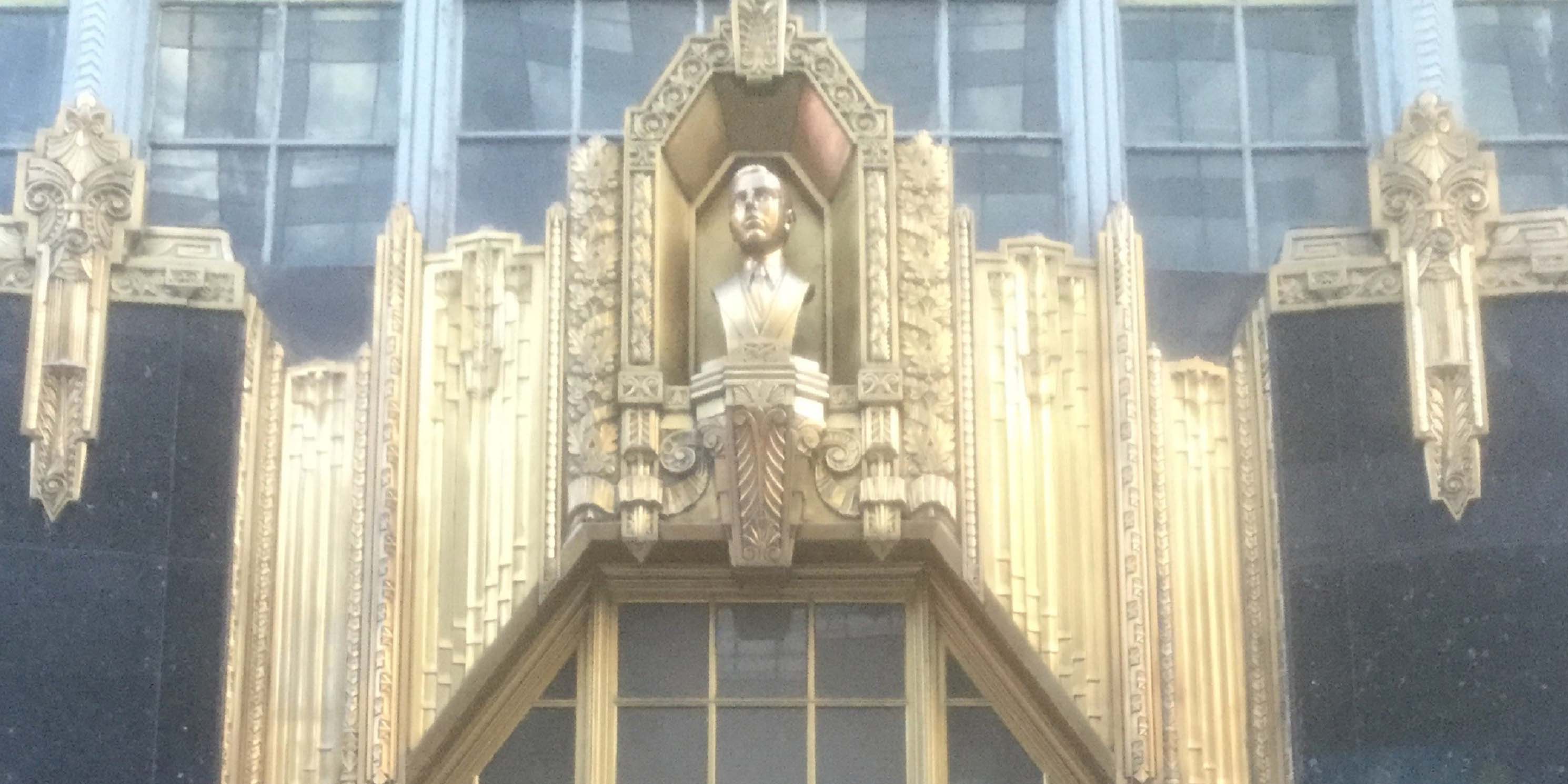 Bust on the exterior of the Brill Building