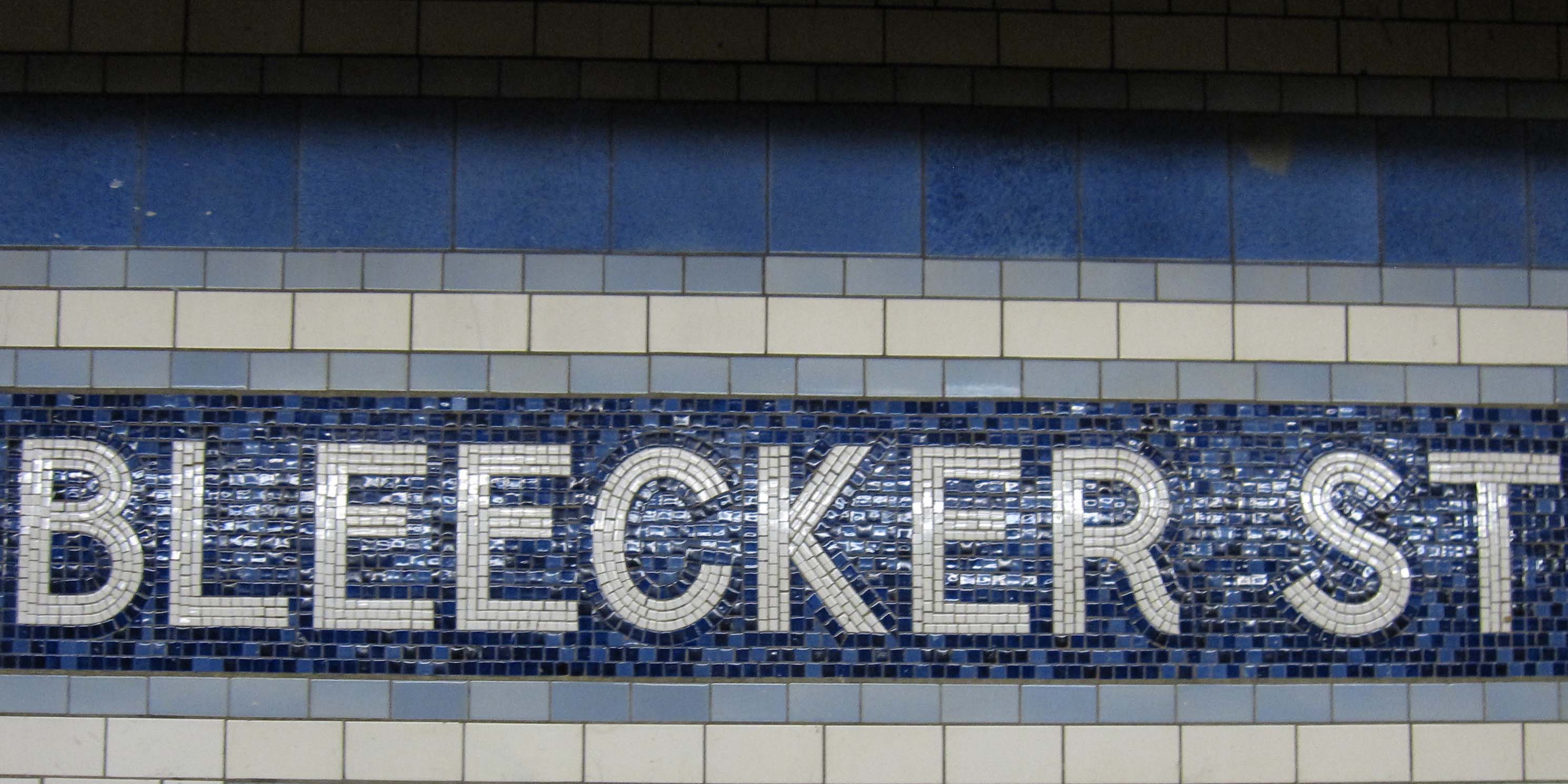 Tile sign in the Bleeker Street Station