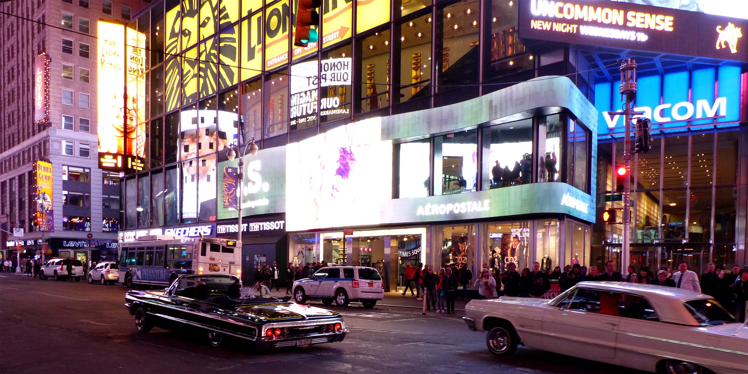 Midtown Manhattan's Duffy Square at night