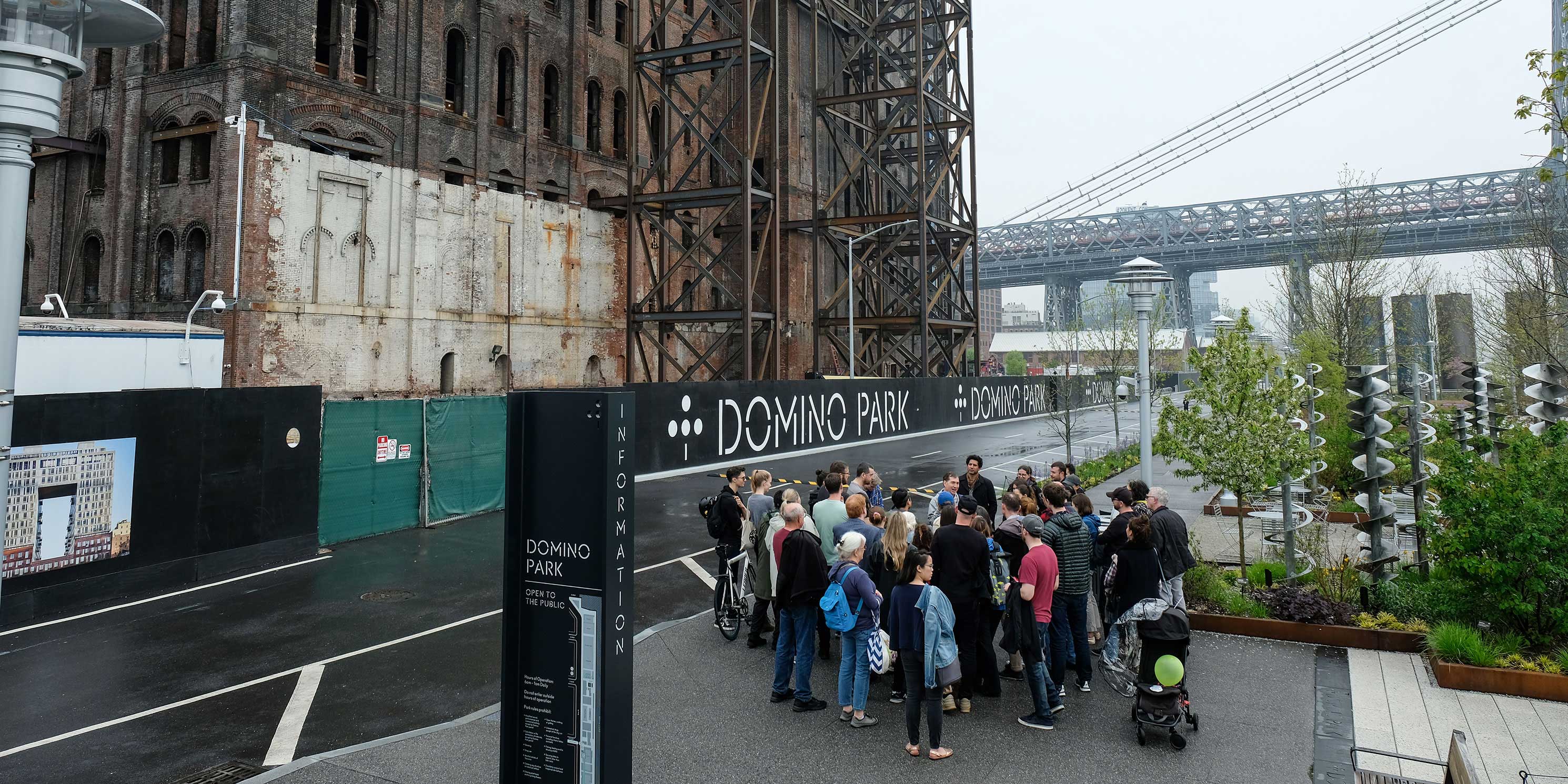 group outside Domino Refinery