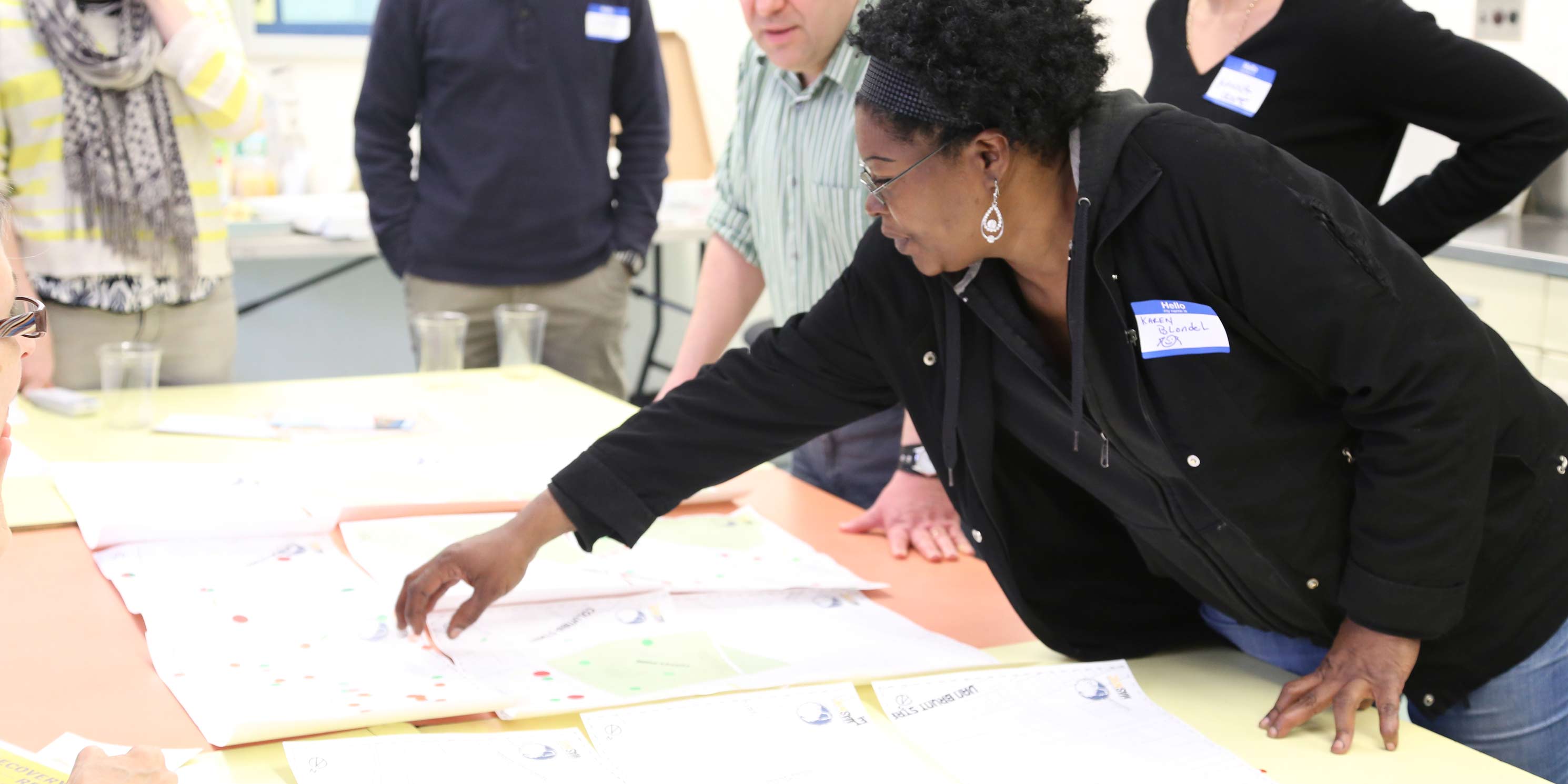 workshop participants review maps