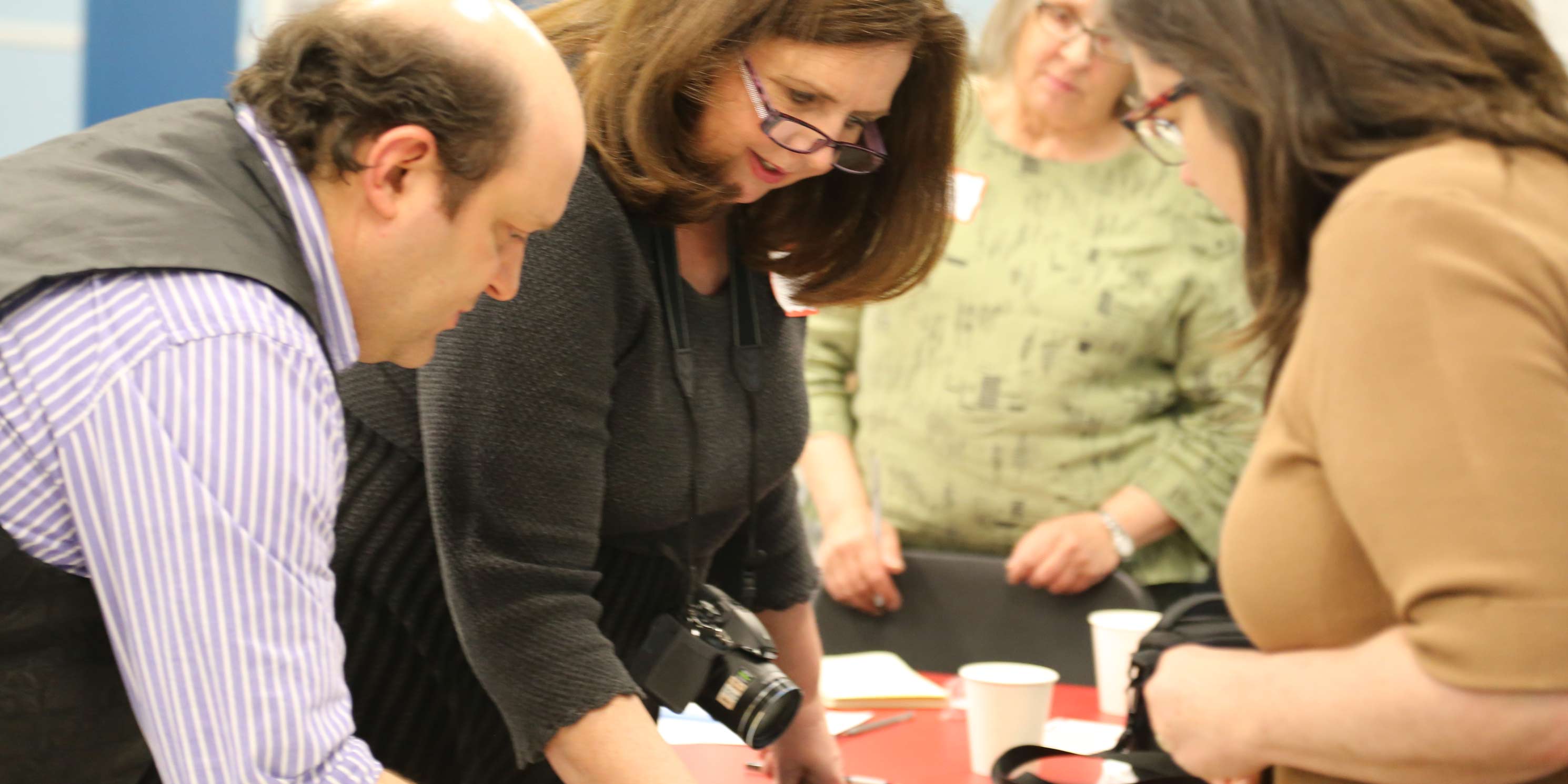 Members consult at a Livable Neighborhoods Workshop