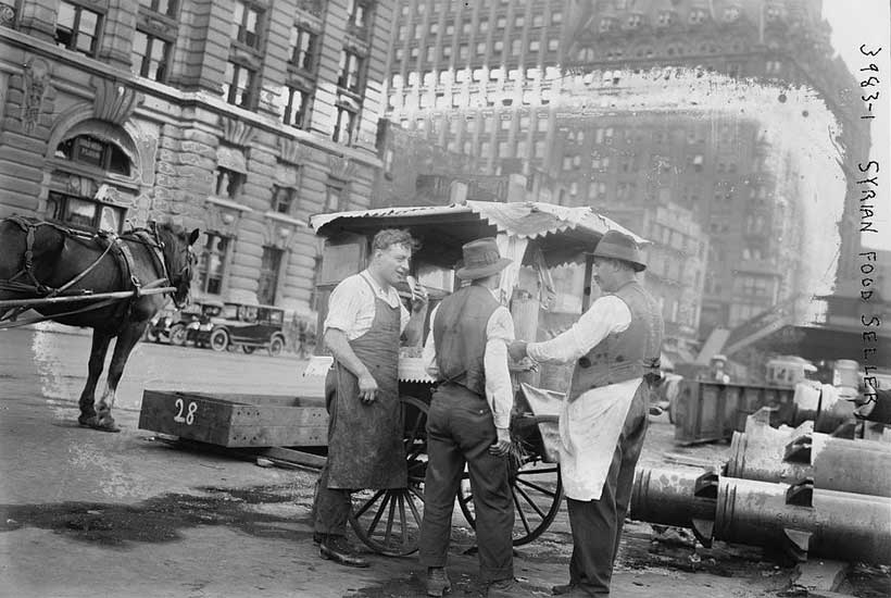 A Syrian food seller with his cart, early 1900s