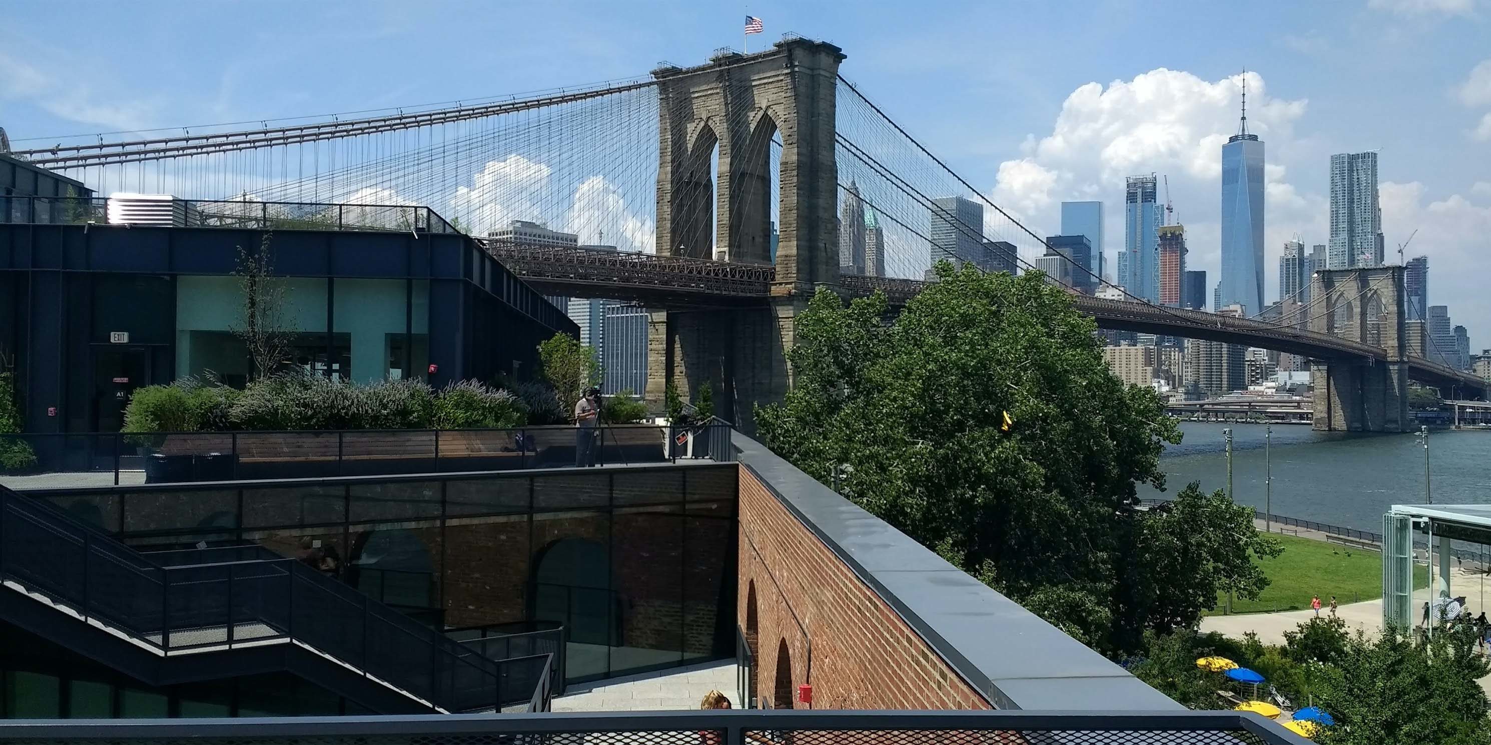 the Brooklyn Bridge as seen from a roof desk in Brooklyn