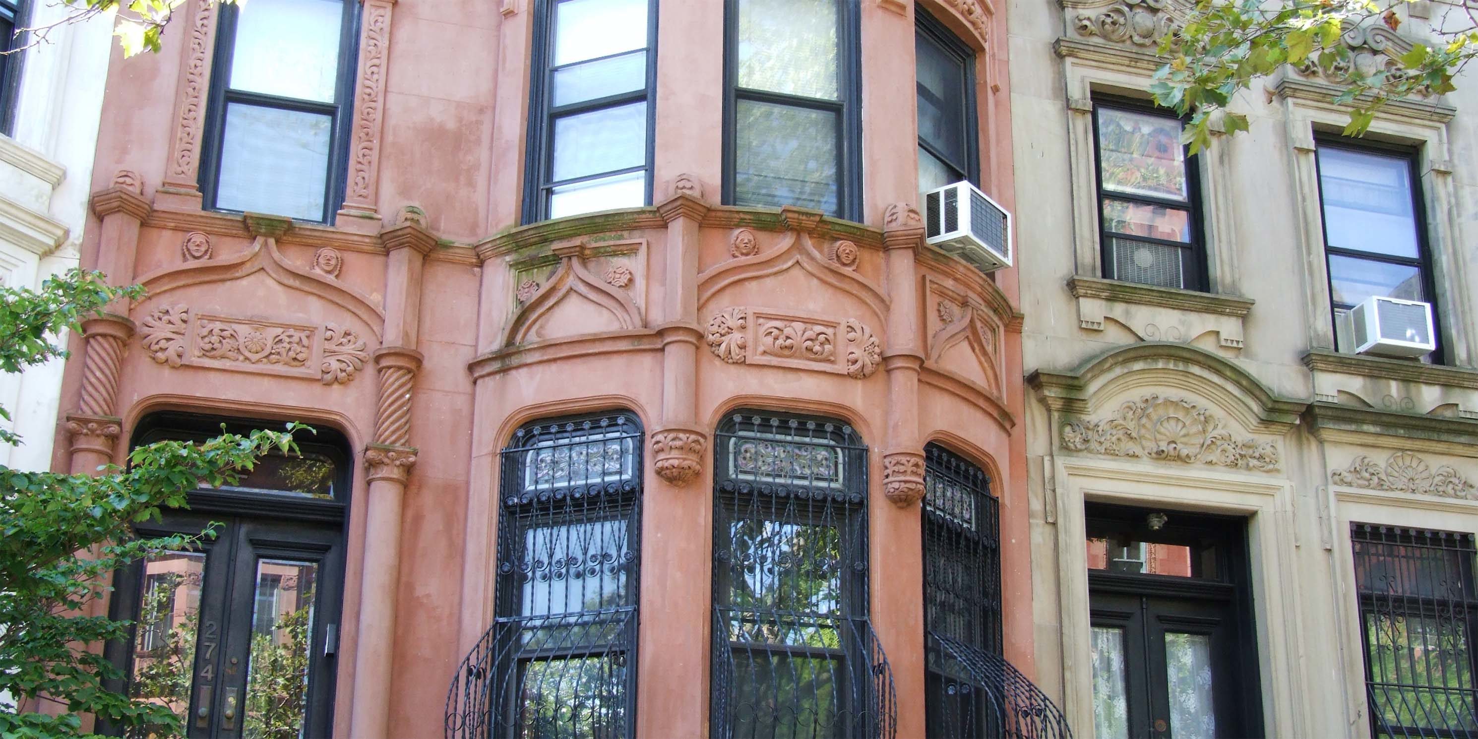 front of brownstone in Brooklyn with ornate facade