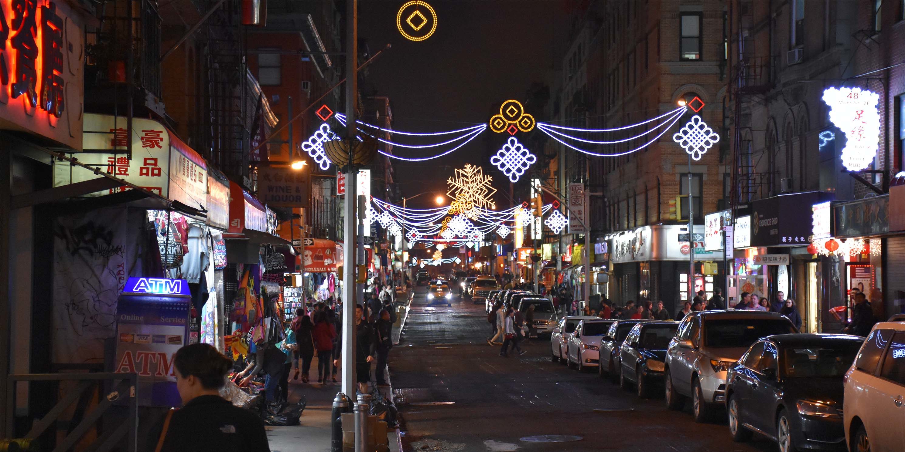 Mott Street at night with festive lights