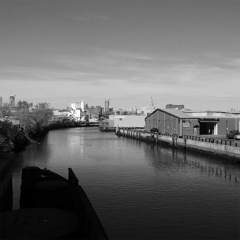 Gowanus Canal with industrial buildings along shoreline