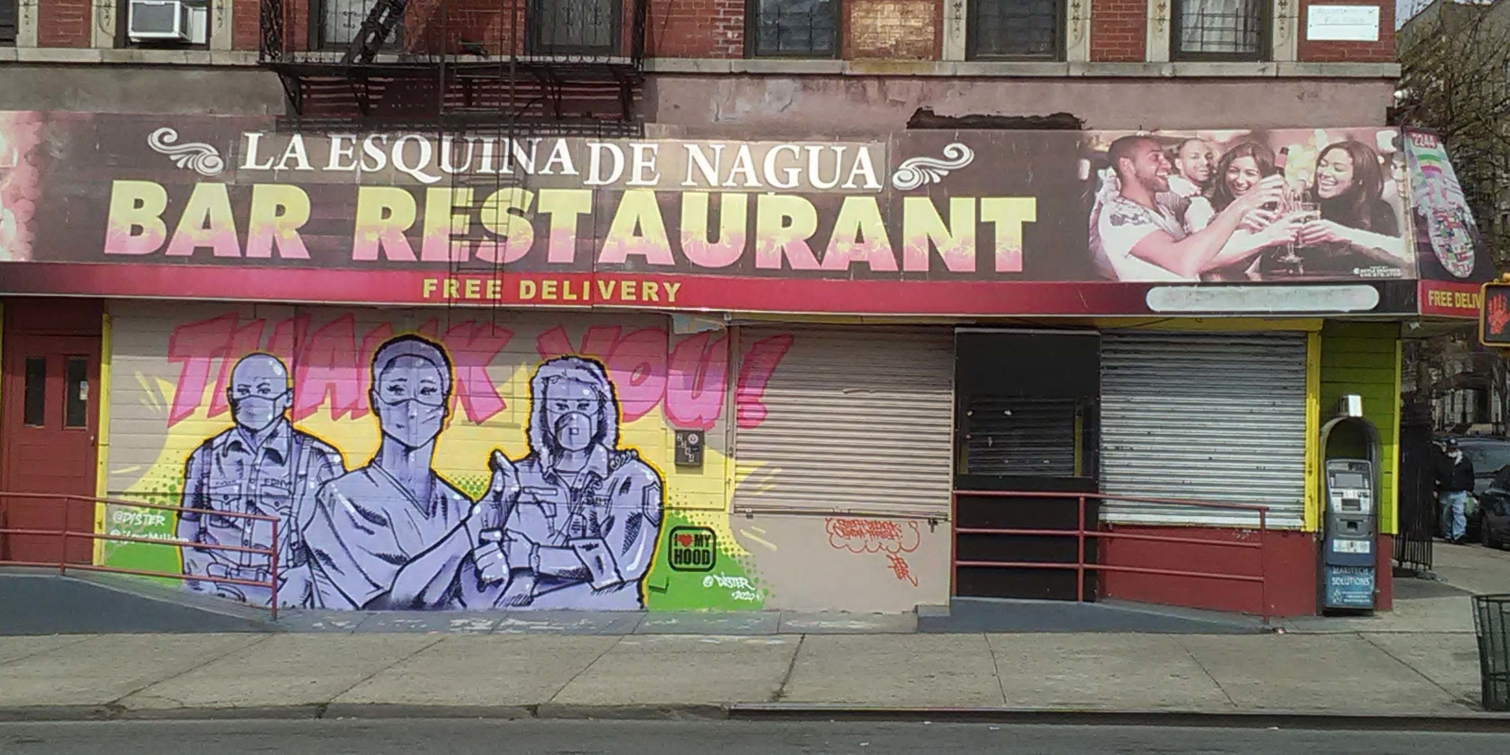 mural depicting medical workers outside a restaurant