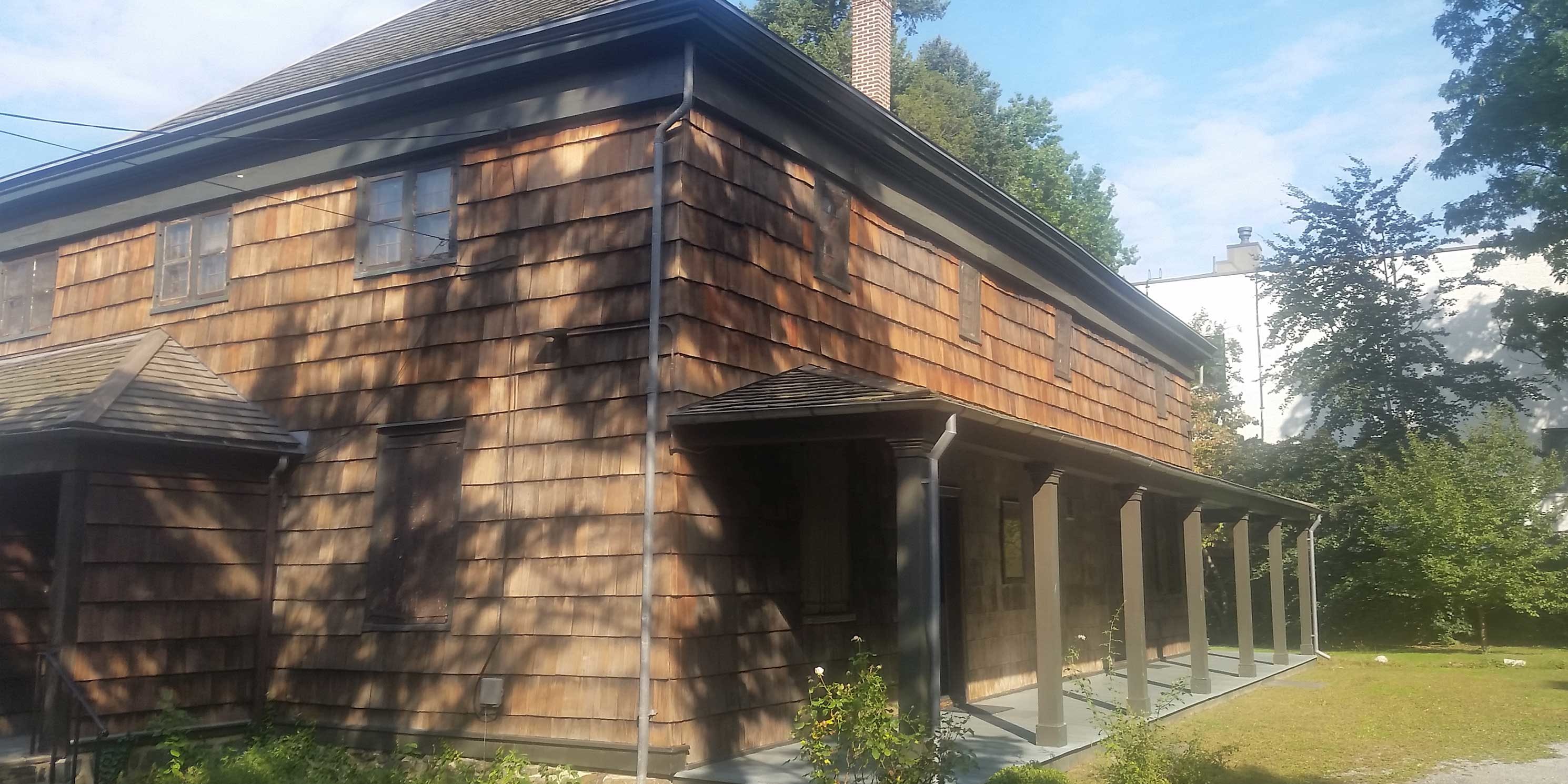 exterior of the wooden Quaker Meeting House in Queens, New York