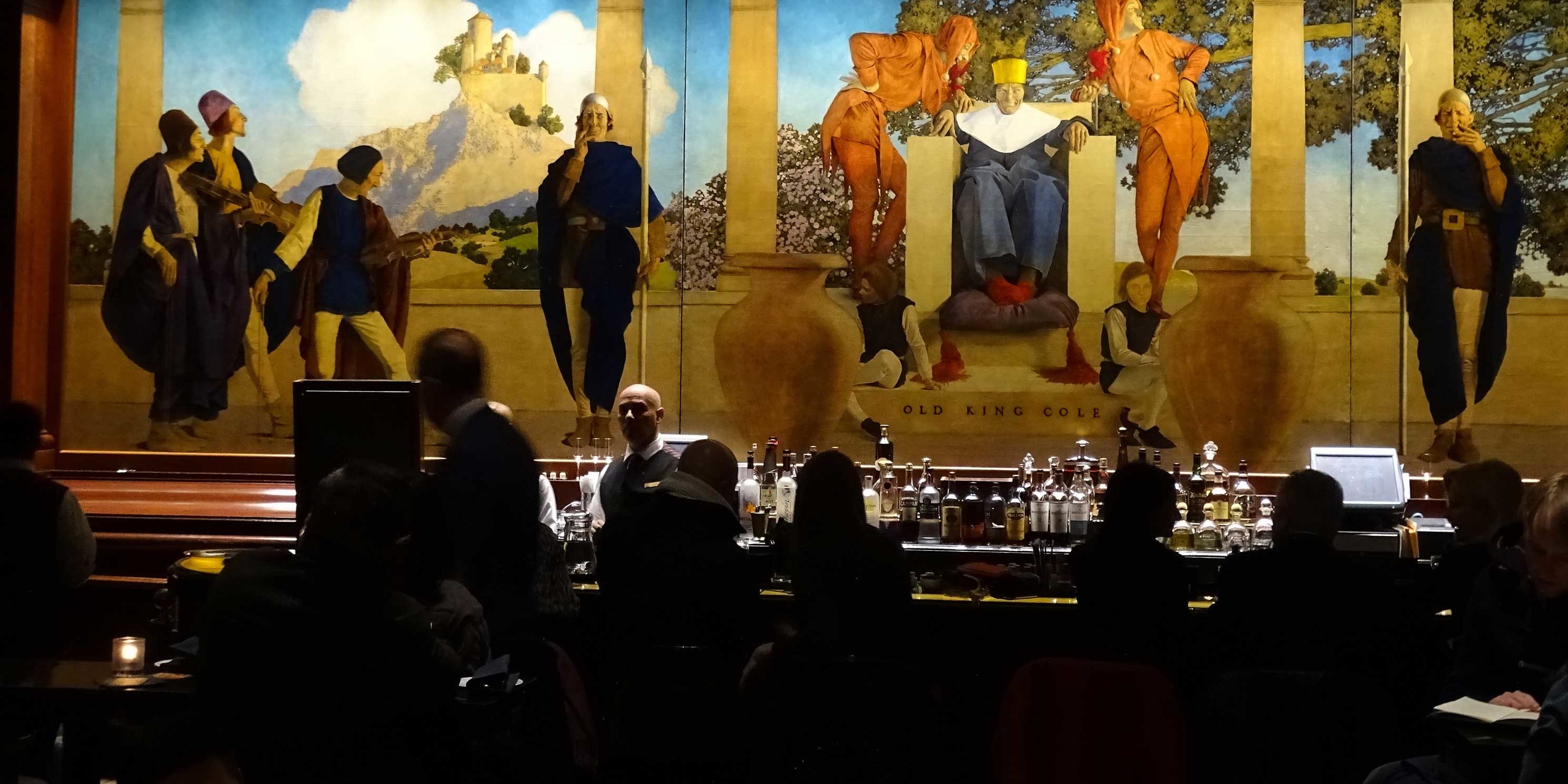 bar with ornate mural behind it, the Old King Cole Bar in the St. Regis Hotel