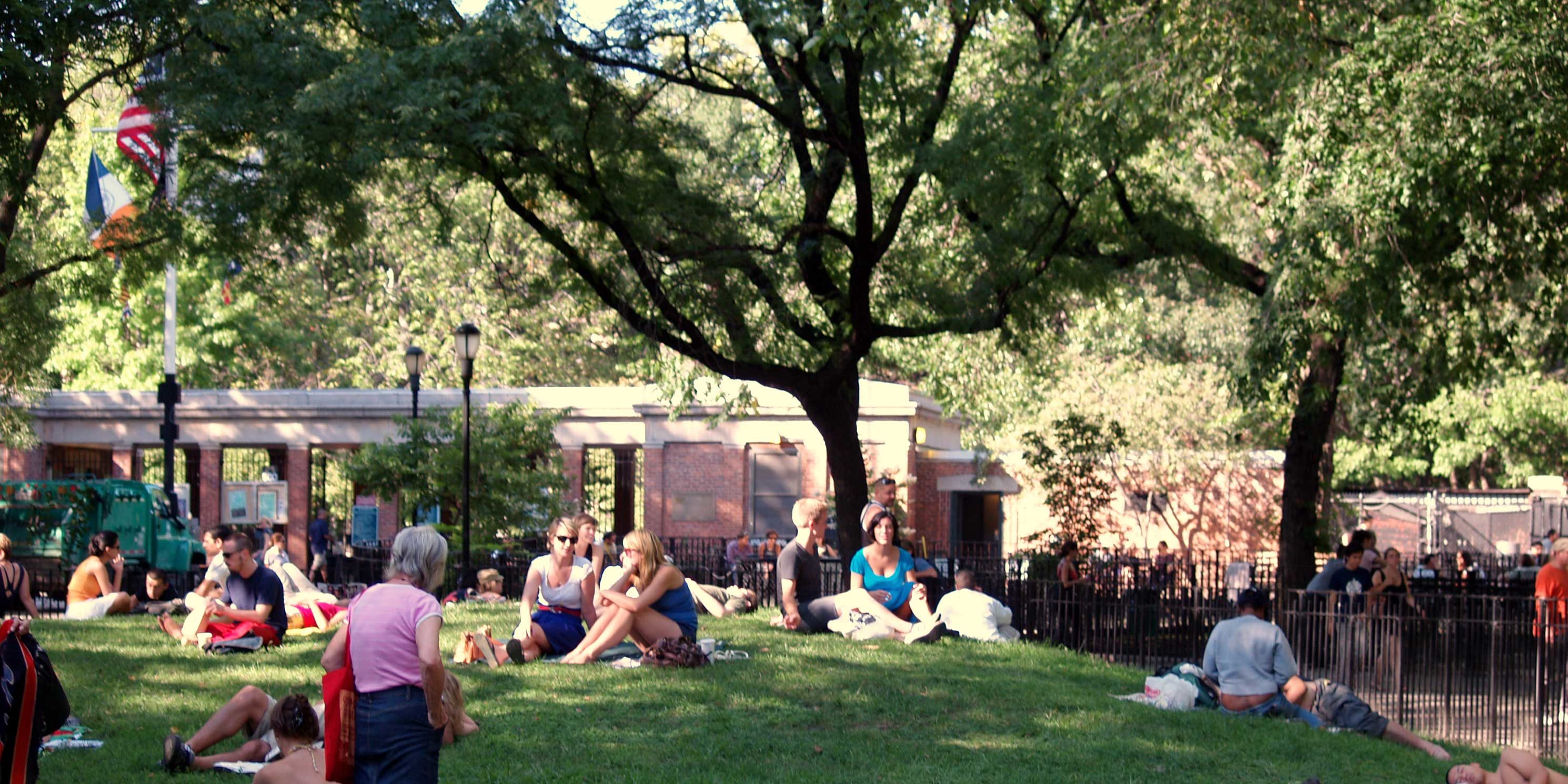 sunbathers in Tompkins Square Park