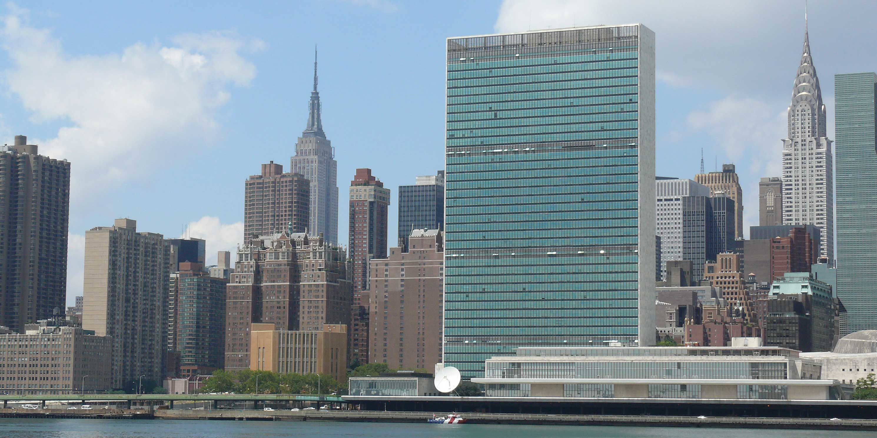 view of Manhattan with the United Nations, Empire, and Chrysler buildings in view