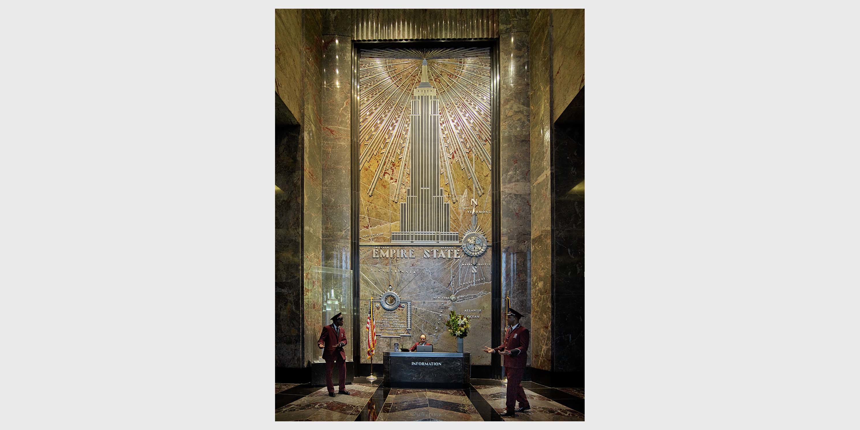 information desk with attendants in the Empire State Building lobby